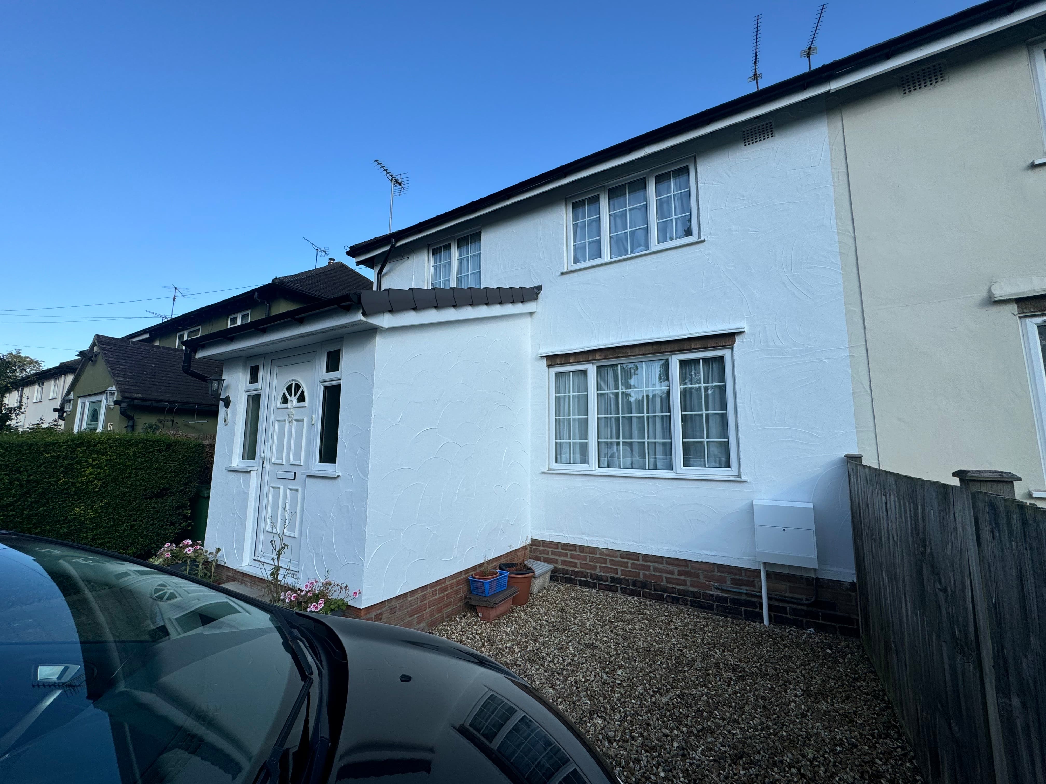 Side view of porch and front wall after painting in Basingstoke